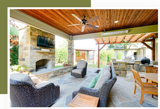 A patio with furniture and a fireplace in it.